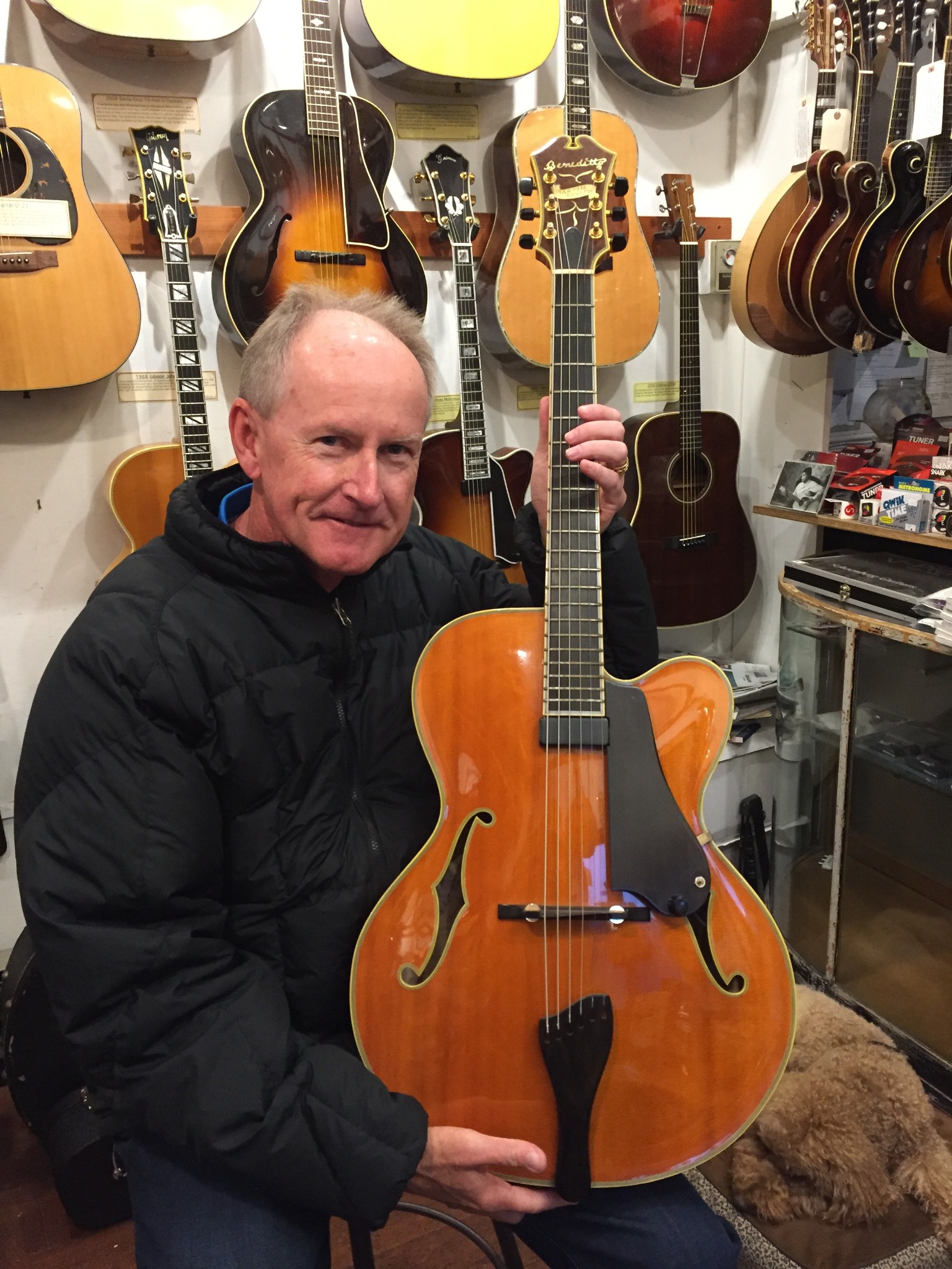 Gary Thomas holding a Benedetto archtop, original photograph